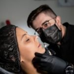 a man injecting woman s nose