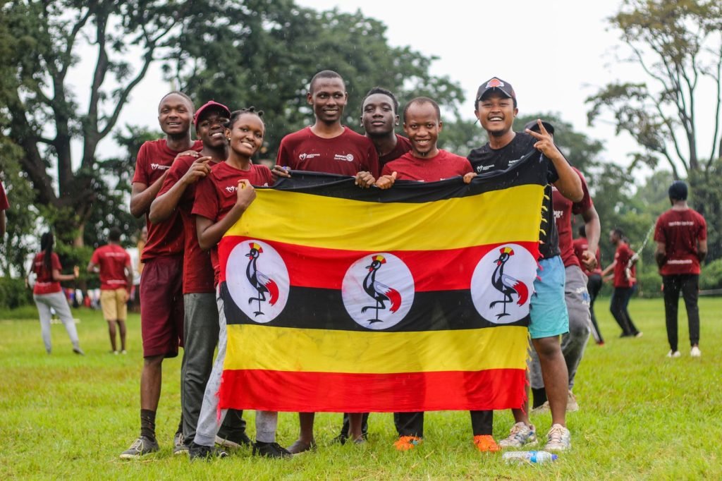group of people holding a flag