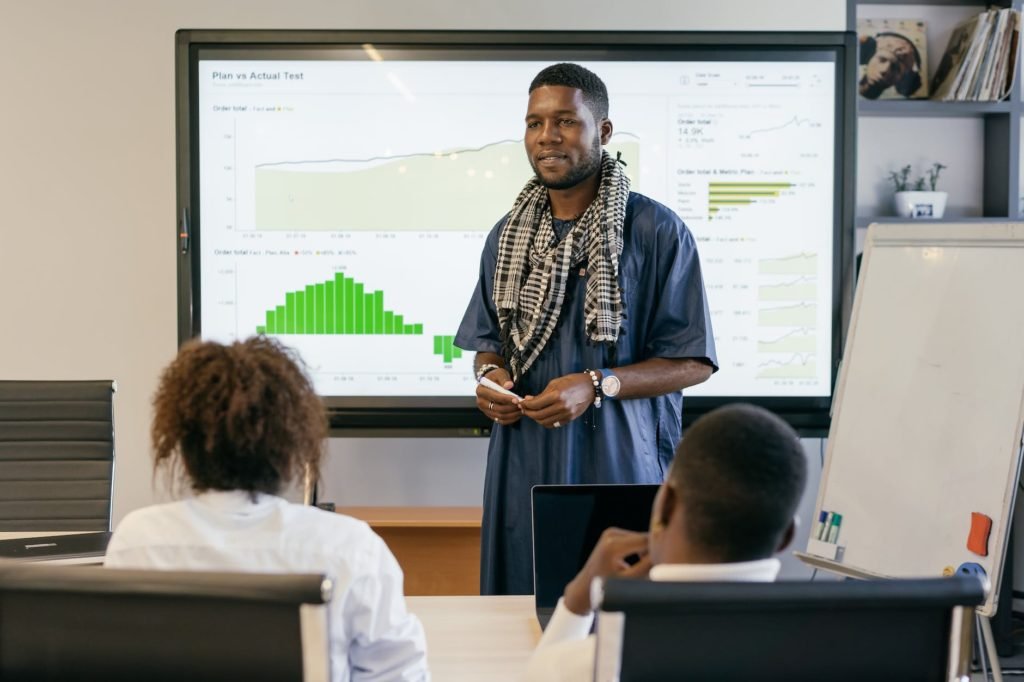 a man making a business presentation to colleagues