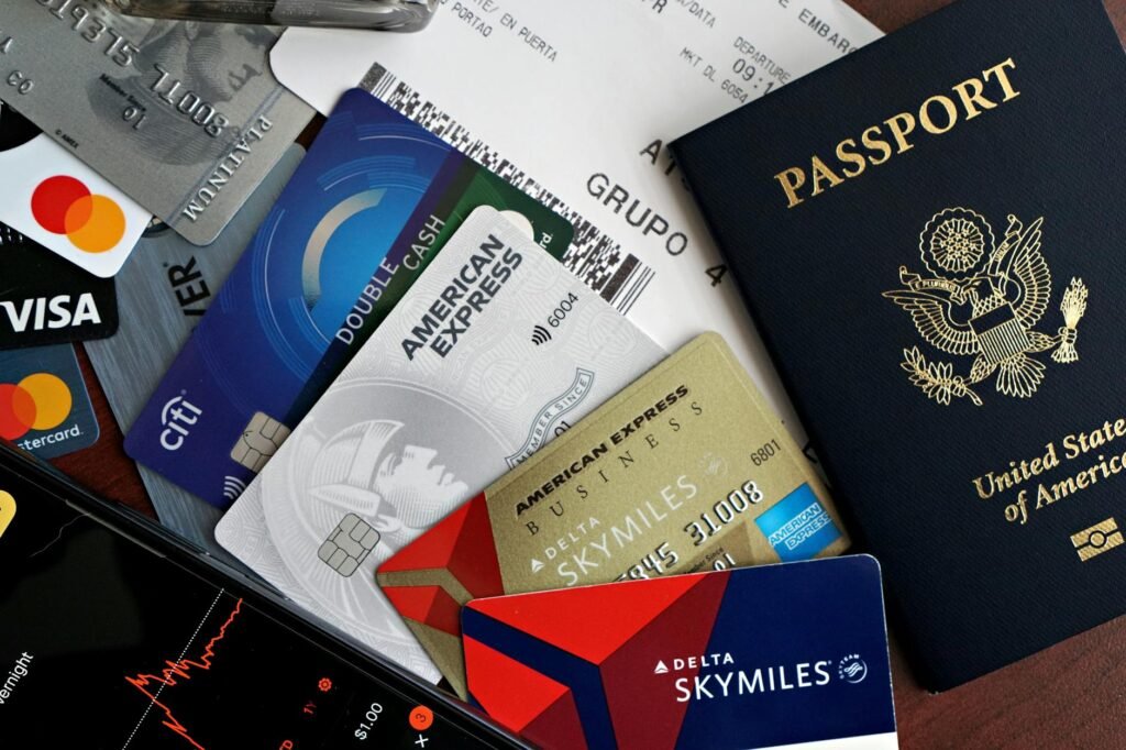 travel essentials passport credit cards and boarding pass - How to Get Insurance as a Traveler in France
